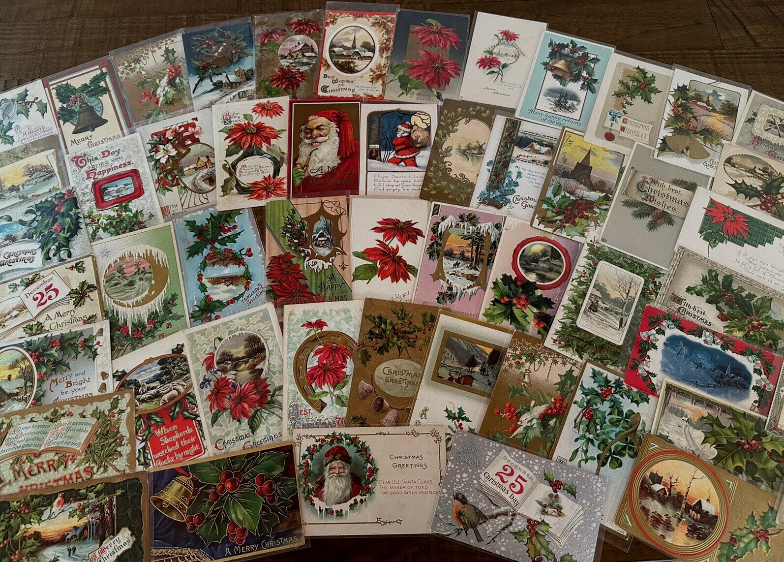 Huge Lot of 62 Antique Christmas~ Xmas Postcards~3 Santa\'s~in sleeves~h842