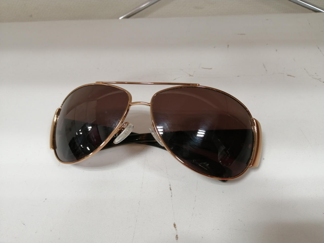 PRADA black x gold sunglasses