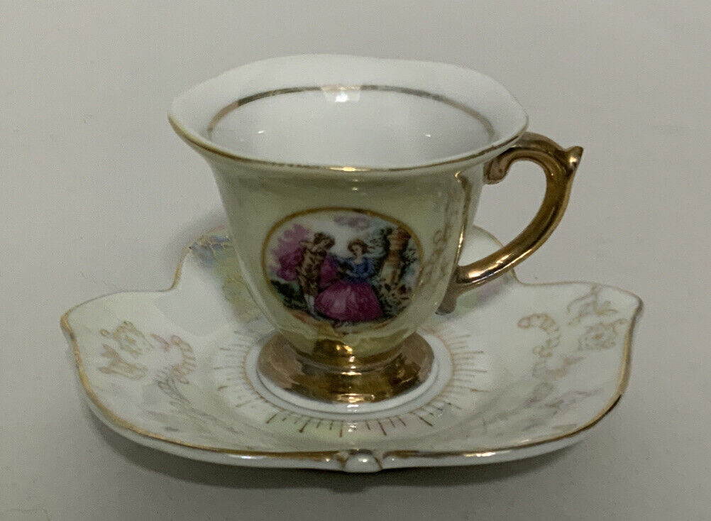 Vintage Unmarked Porcelain “Victorian Scene” Tea Cup and Saucer Set