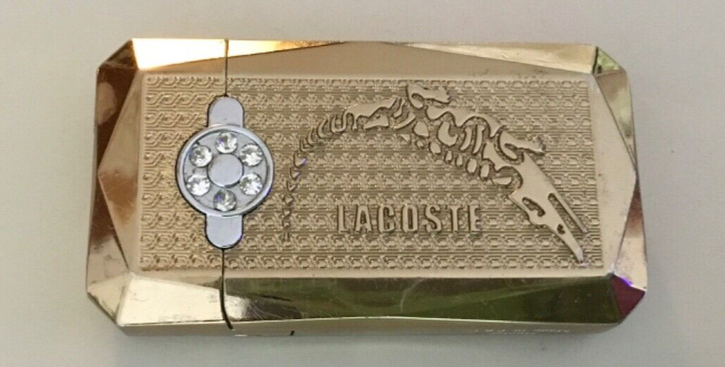 Vintage rare Lacoste goldtone lighter