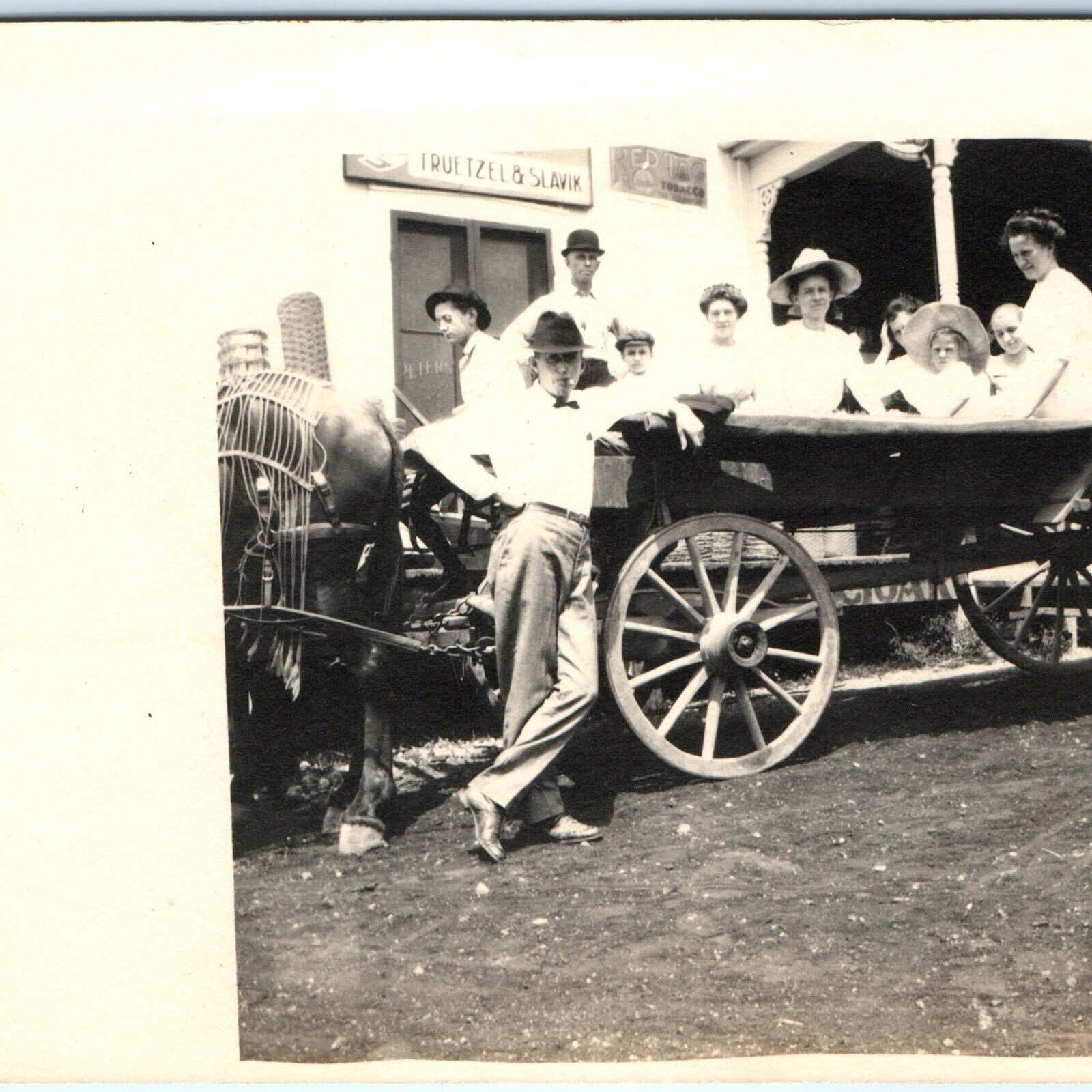 c1910s Men Women in Wood Wagon RPPC Tobacco Shop Real Photo Cigar Red Tag A125