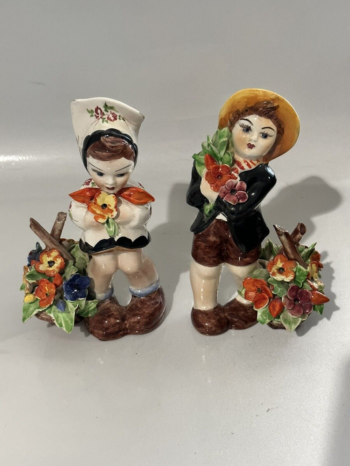 vintage Dutch flower girl and boy with baskets of flowers glazed porcelain 6.5\