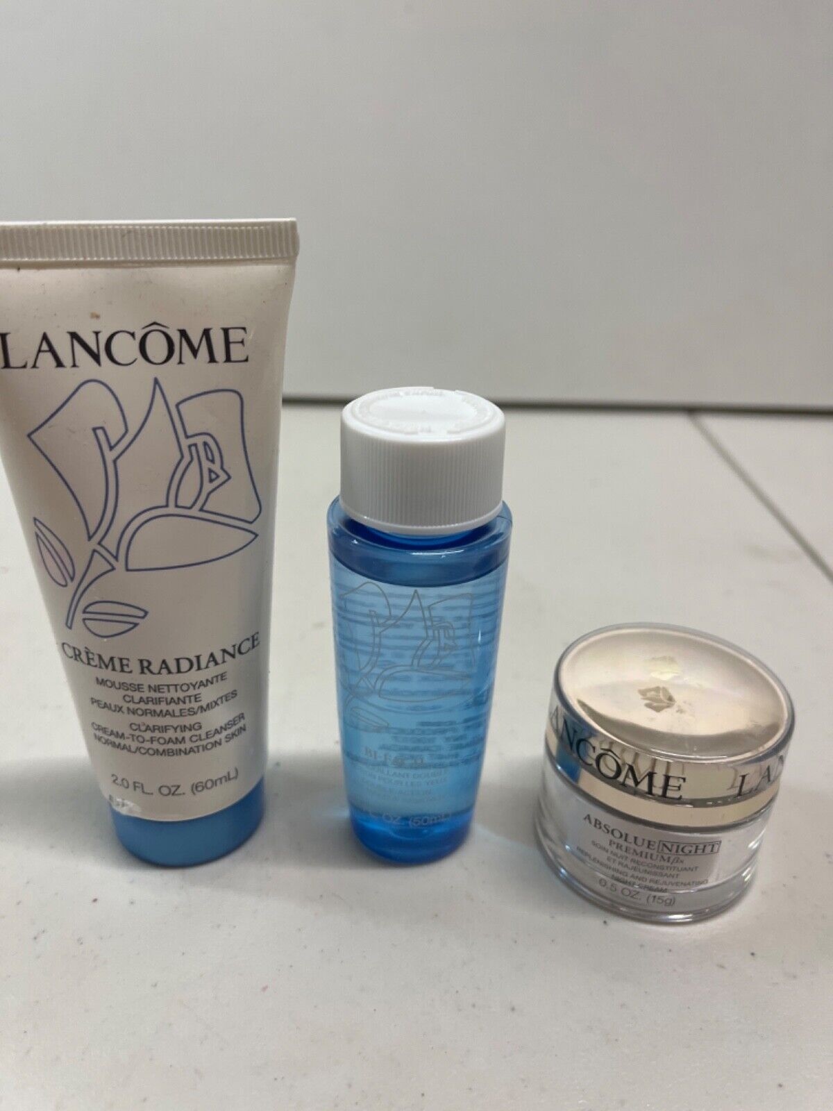 Lancome Bi-Facial 1.7 fl oz., Creme Radiance 2 fl oz and Absolue Night .5 oz