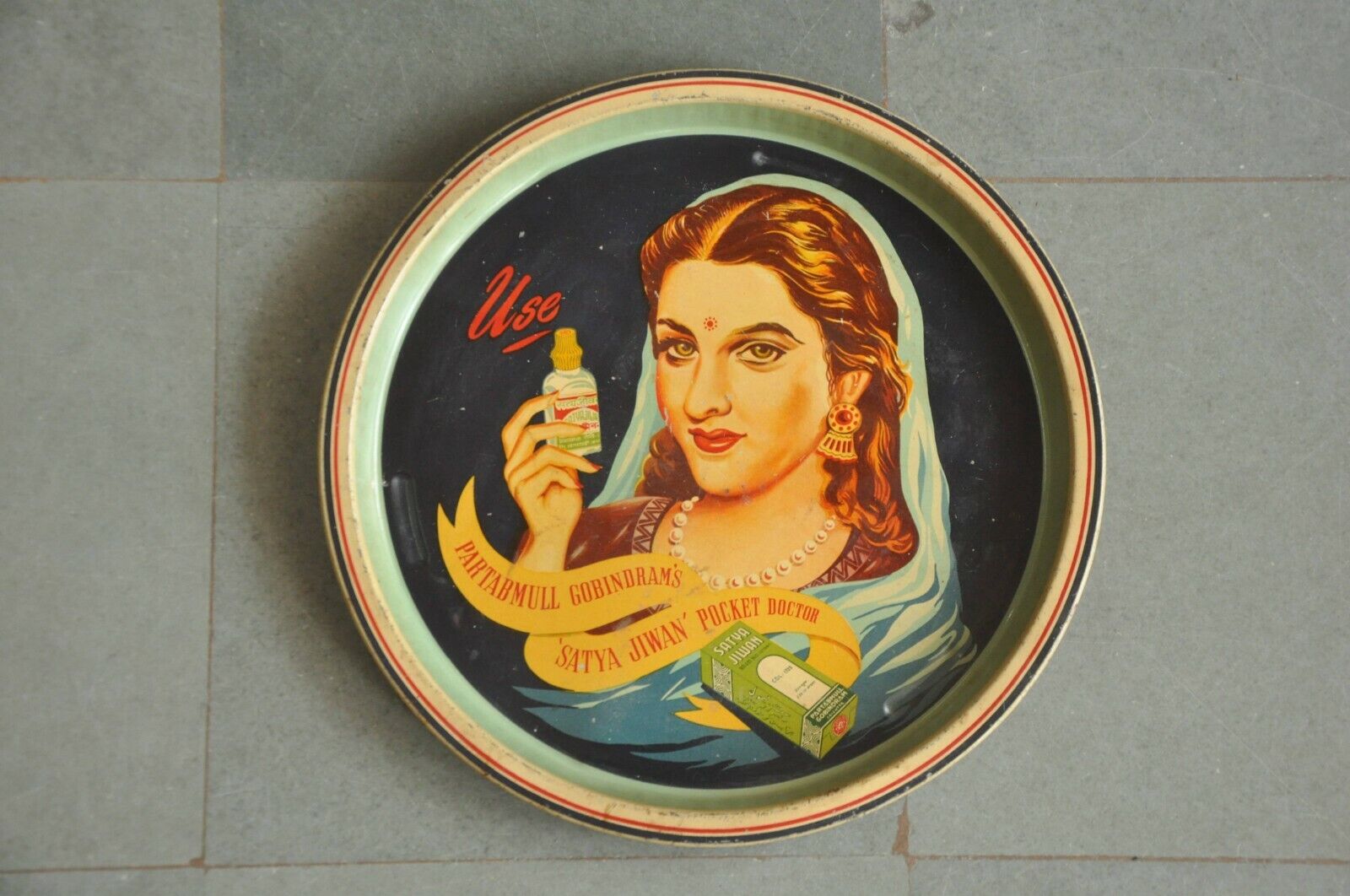Vintage Round Partabmull Gobindram's Satya Jiwan Medicine Ad Litho Tin Sign