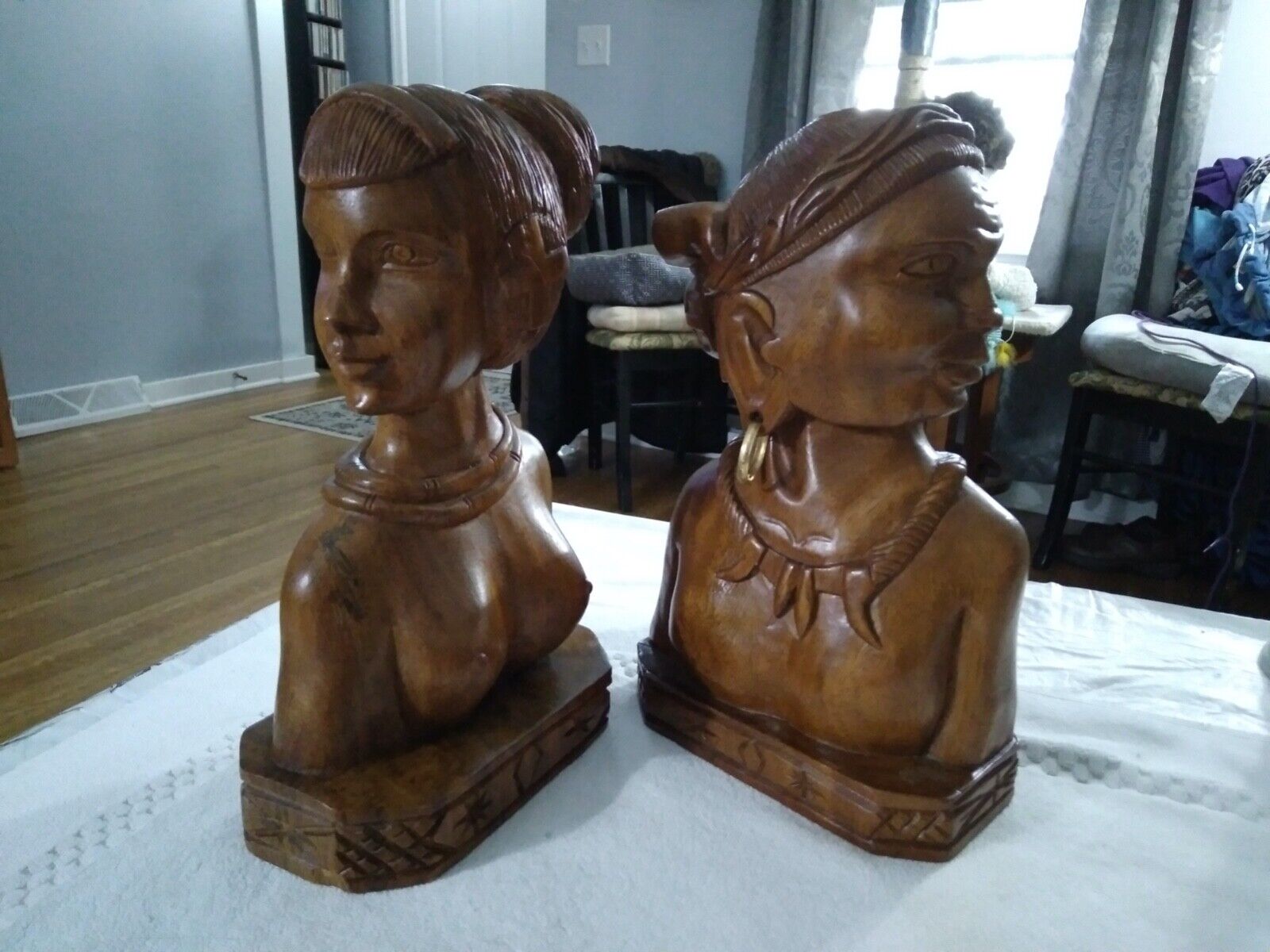WOODEN SCULPTURE - HAND CARVED OF AN ETHNIC MAN AND A WOMAN. 12\