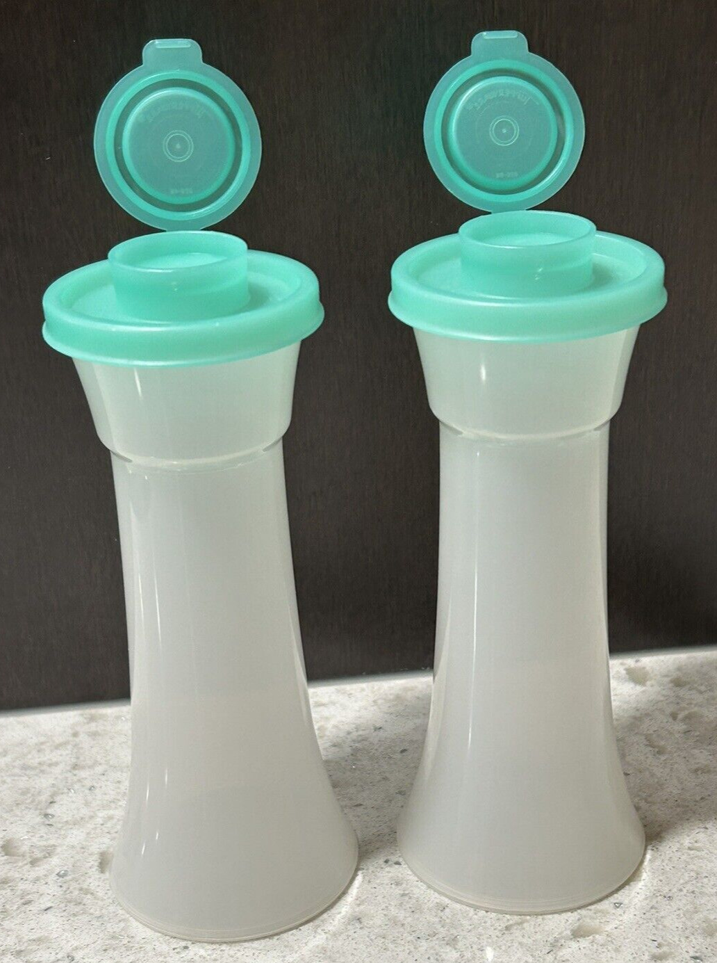 Tupperware Hour Glass Salt and Pepper Shakers with Blue Green Lids- Very clean