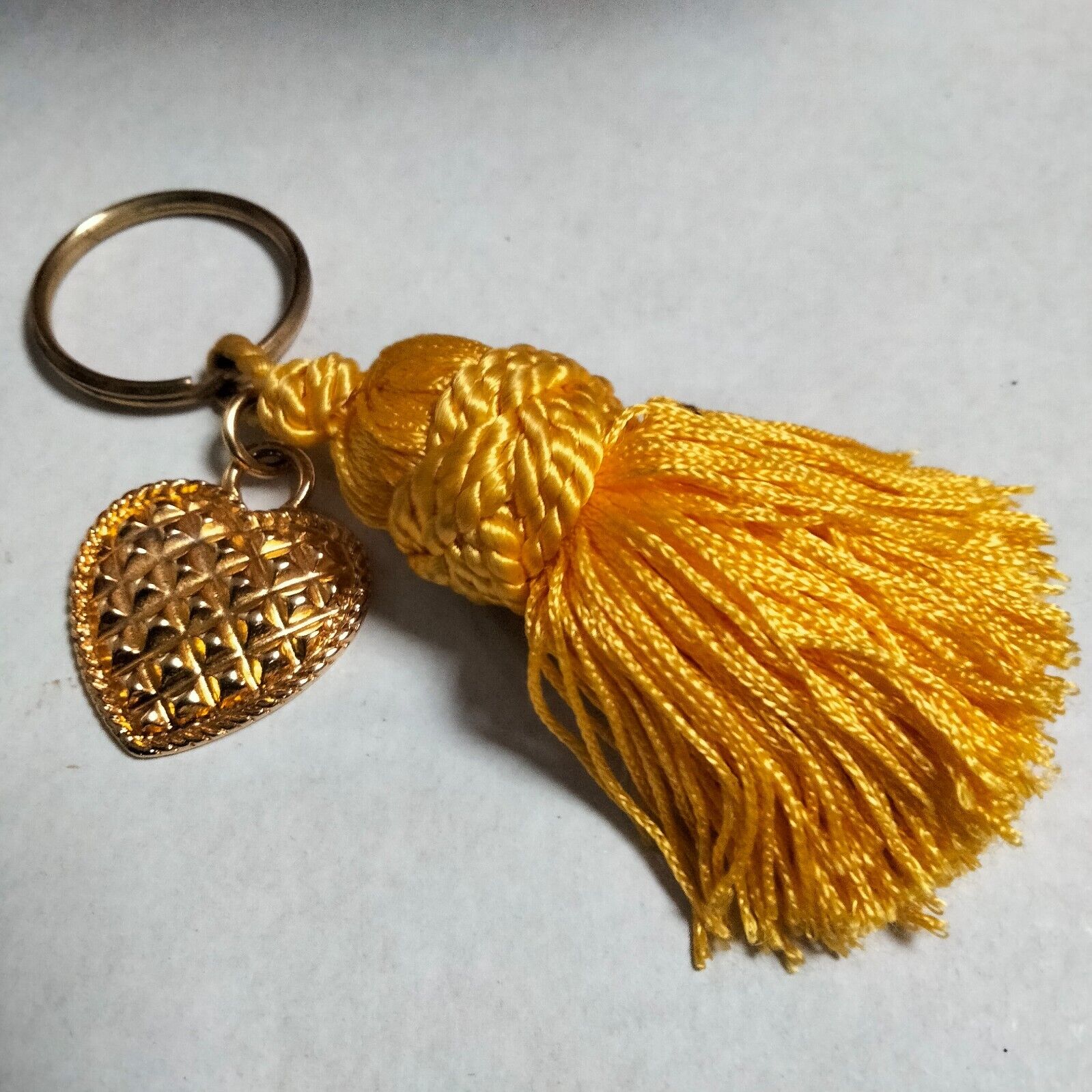 Keychain collector * BALENCIAGA * gold steel heart + used yellow pompon