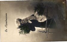 Vintage Postcard- A woman with a branch. Early 1900s picture