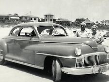 F8 Photograph Side View Old Desoto Car Parked On Beach Sand Cute Old Couple  picture