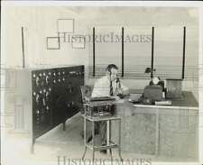 1933 Press Photo Radio Operator Transmitting Weather Date to Pilots in Flight picture