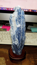 GORGEOUS SPECIMEN OF BLUE KYANITE IN A WOOD STAND picture