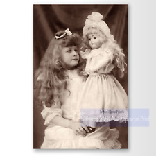 Antique Victorian Era Young Girl Posing with Doll Studio Photo Photo Print picture