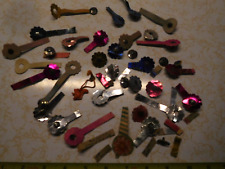 about 25 Vintage 1939-40 Colorful Dance Hall Metal Button Tags & Plastic Charm picture