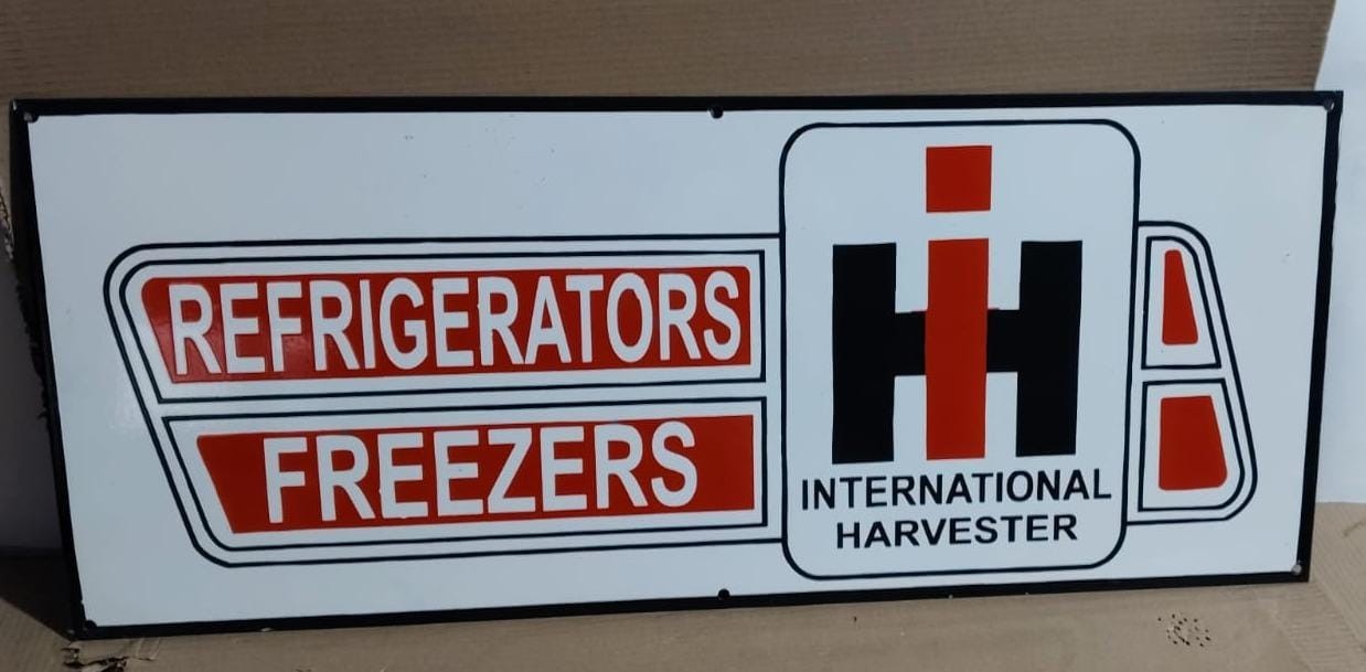 International Harvester Porcelain Enamel Sign  36 x 15 Inches 1 Sided