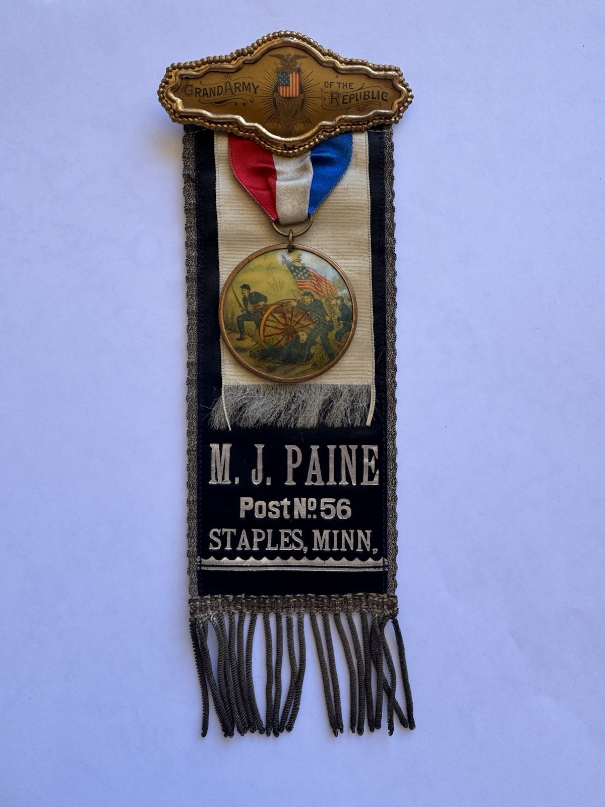 Antique Civil War G.A.R. Ribbon Badge named M.J. Paine Staples, MN.  Post 56 