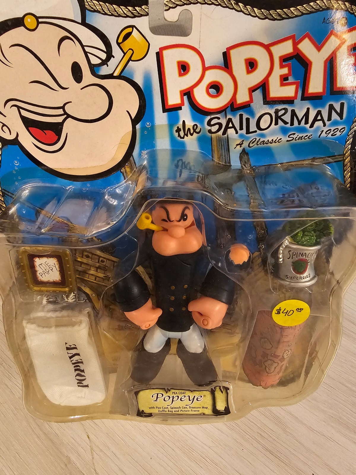POPEYE PEA COAT FIGURE W/ SPINACH CAN, TREASURE MAP DUFFLE BAG AND PICTURE FRAME