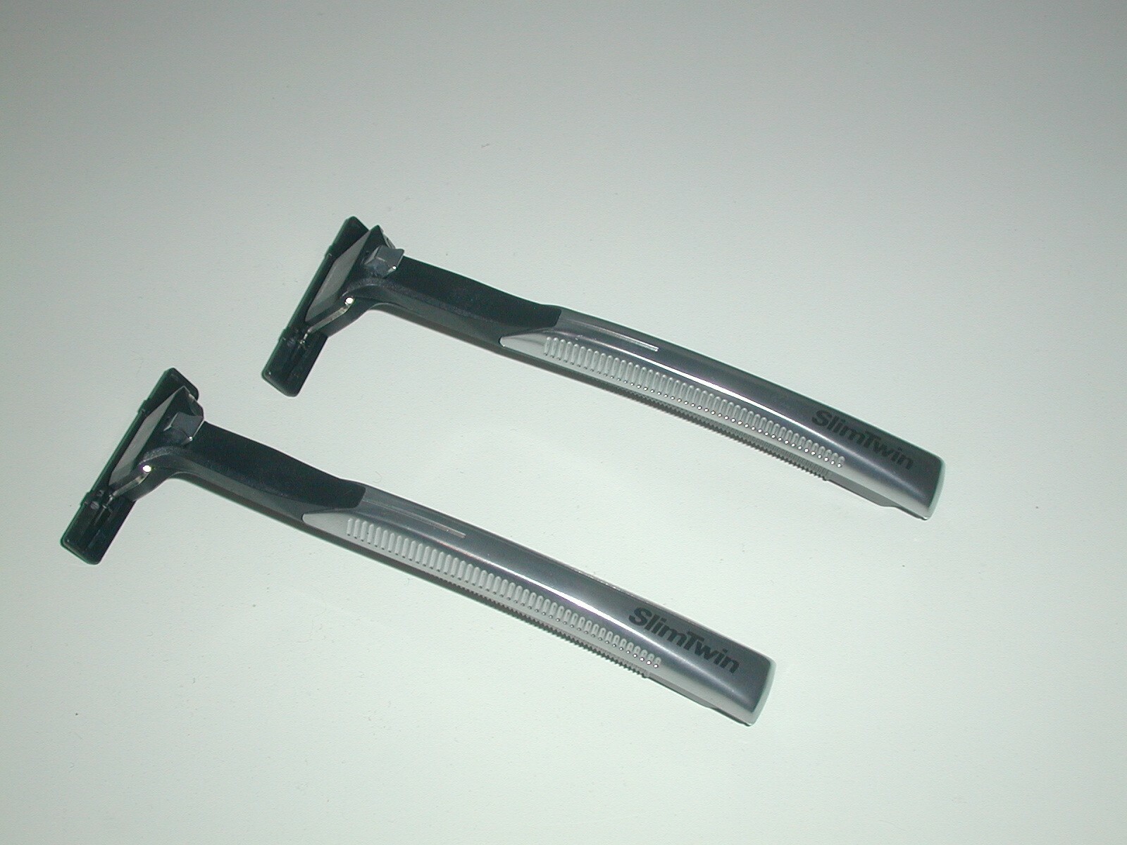 2 Vintage 1989 Schick Slim Twin Razor Handles Slim Head Twin Blade Unused Lot