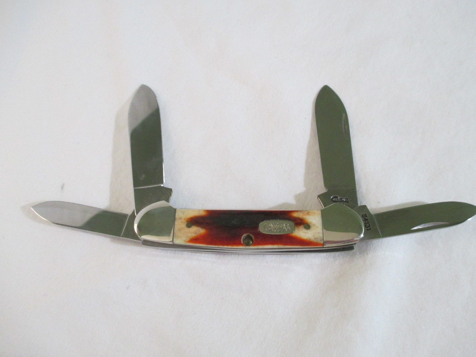 Case XX 1997 Rare Red Stag Big Chief Canoe 4 Blade 54131 SS