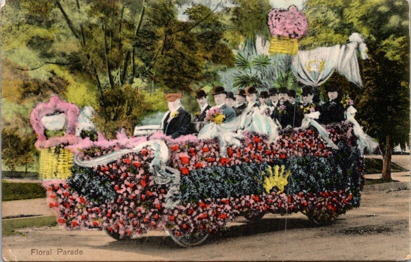 Vintage Postcard Large Group of Men Riding in a Floral Parade Float        15252