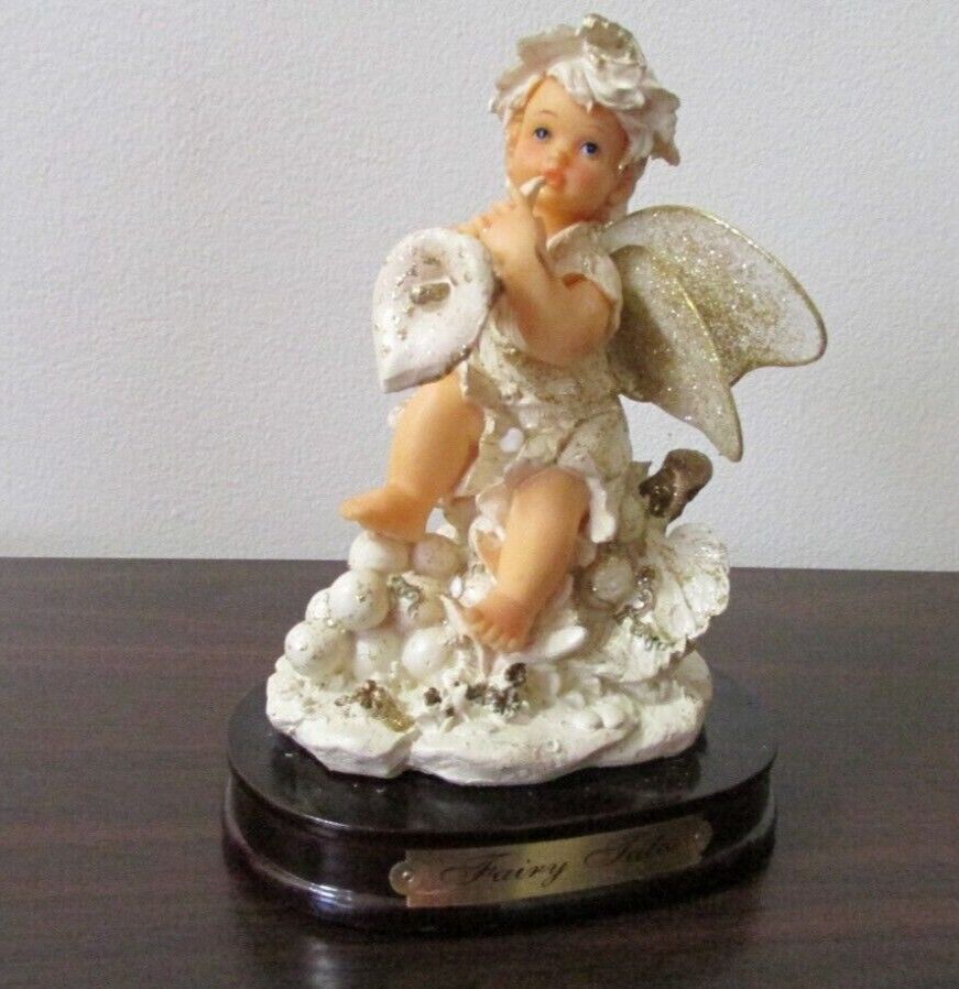 Fairy tales figurine, very beautiful.  designed by M Valenti. Rare find