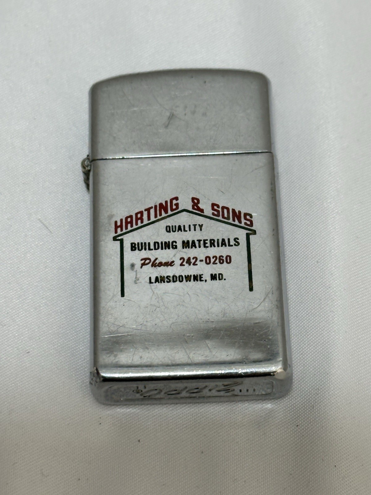 Zippo Vintage 1969 HAATING & SONS  BUILDING MATERIALS Slim Lighter. RARE