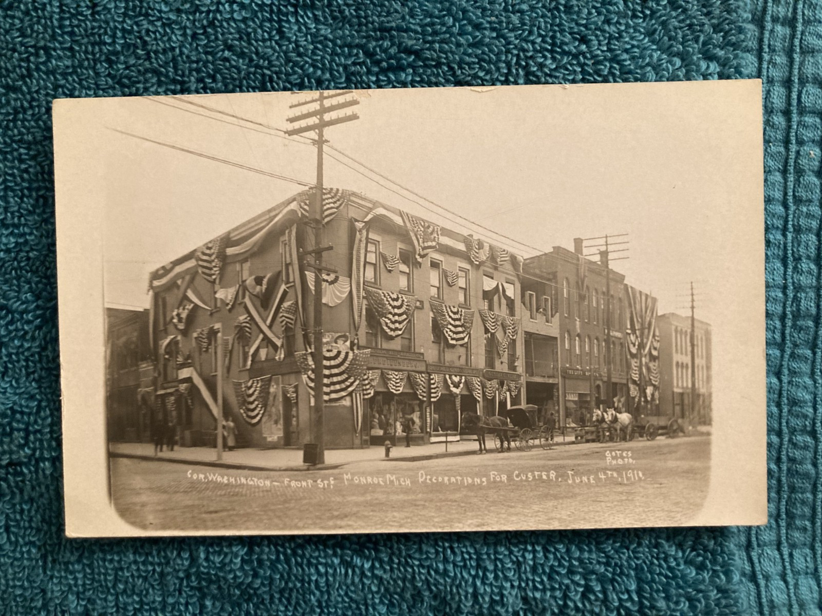 RPPC Monroe Michigan Front St with Decorations for Custer June 4th 1911 Unposted