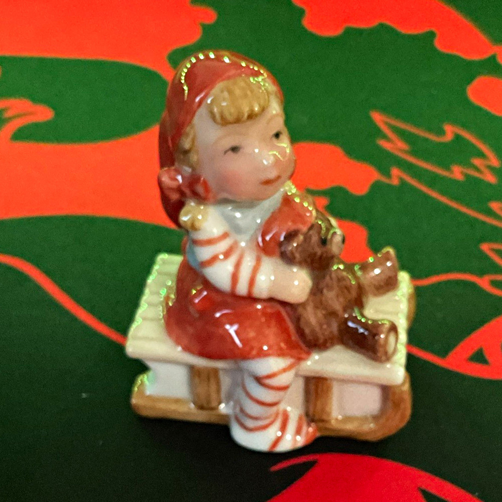 Royal Copenhagen Collections # 764  pixie elf on a sleigh  