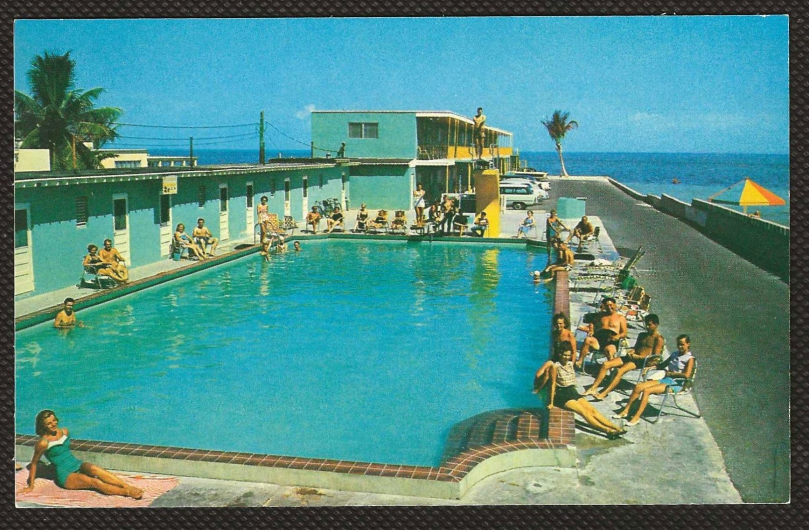 Key West, FL-Florida Sun N Surf Motel Vintage Poolside Scene Postcard