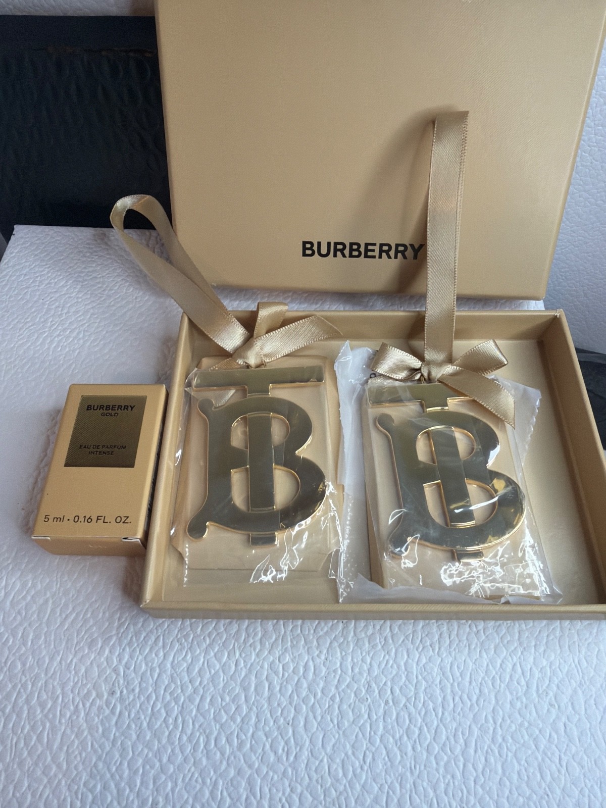 Burberry Gold intense 5ml and Christmas Ornament 2 in a Box. Collectors items.