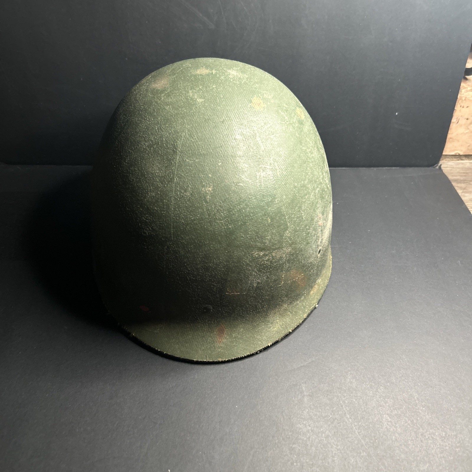WWII U.S. M1 liner with a rayon suspension and leather sweatband.