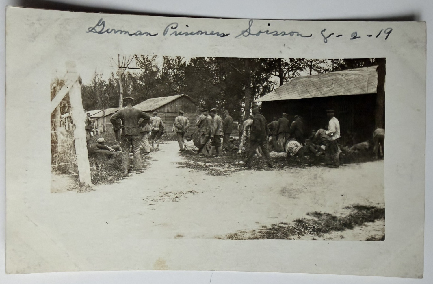 c1919 RPPC WWI German POW Camp Soissons France Handcuffed Prisoners Photo PC