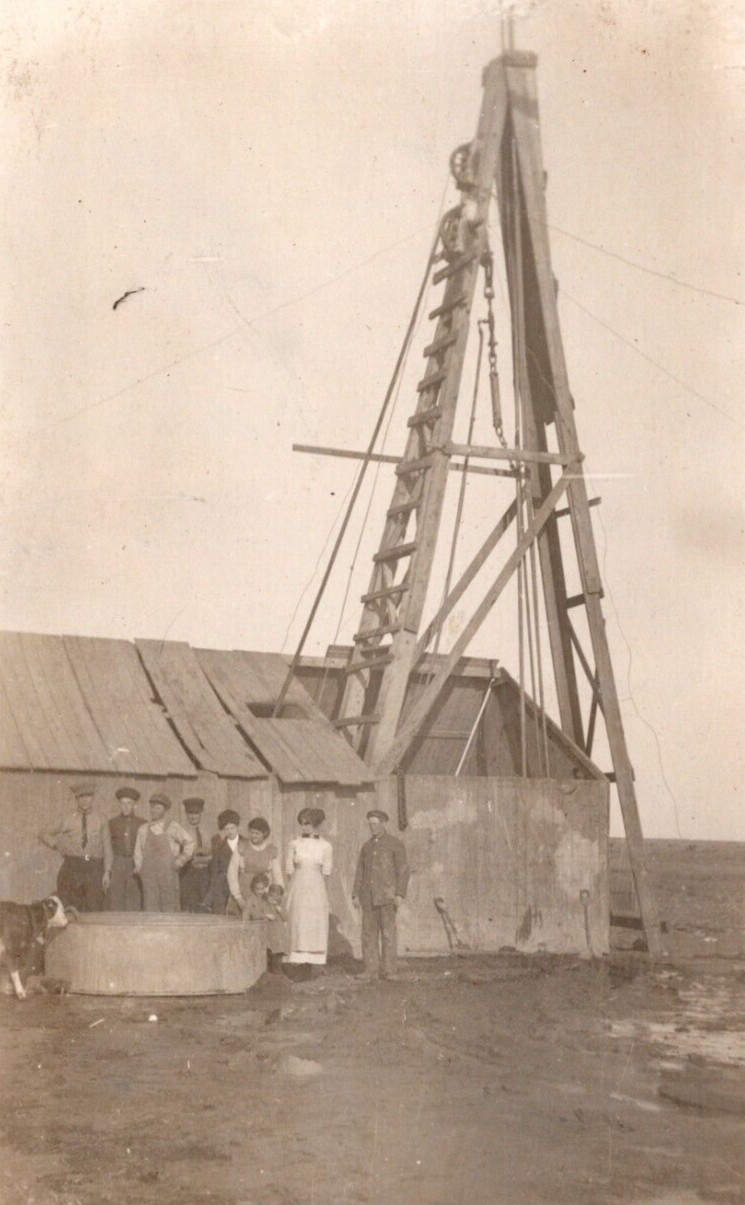 RPPC Family Stands By Newly Constructed Water Well Calf Drinks ANTIQUE Postcard