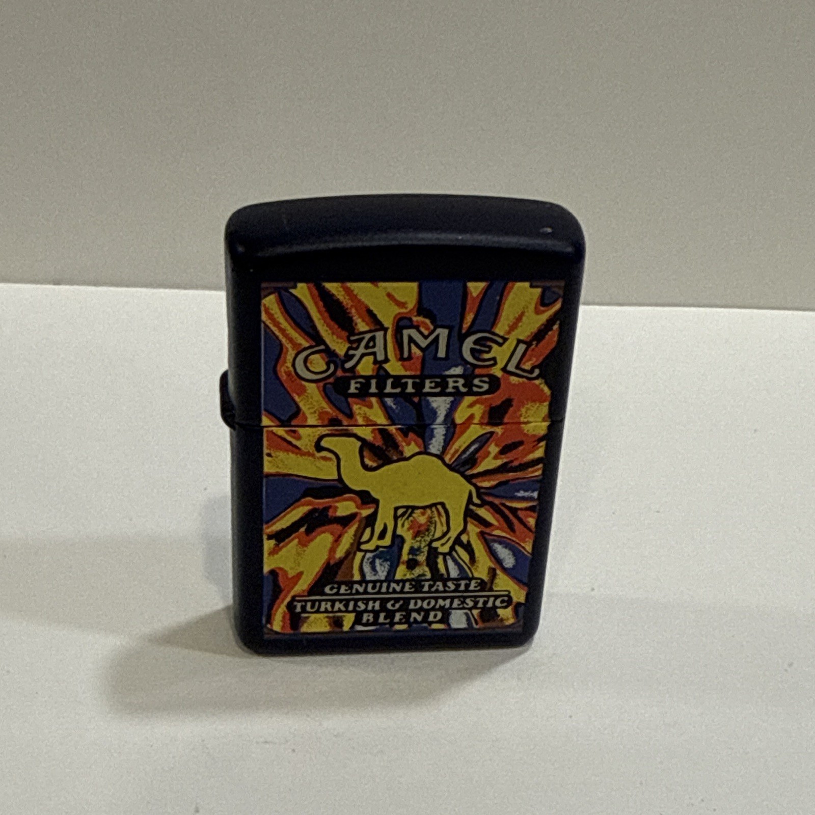 Camel Filters flip-top lighter black with Camel logo graphic