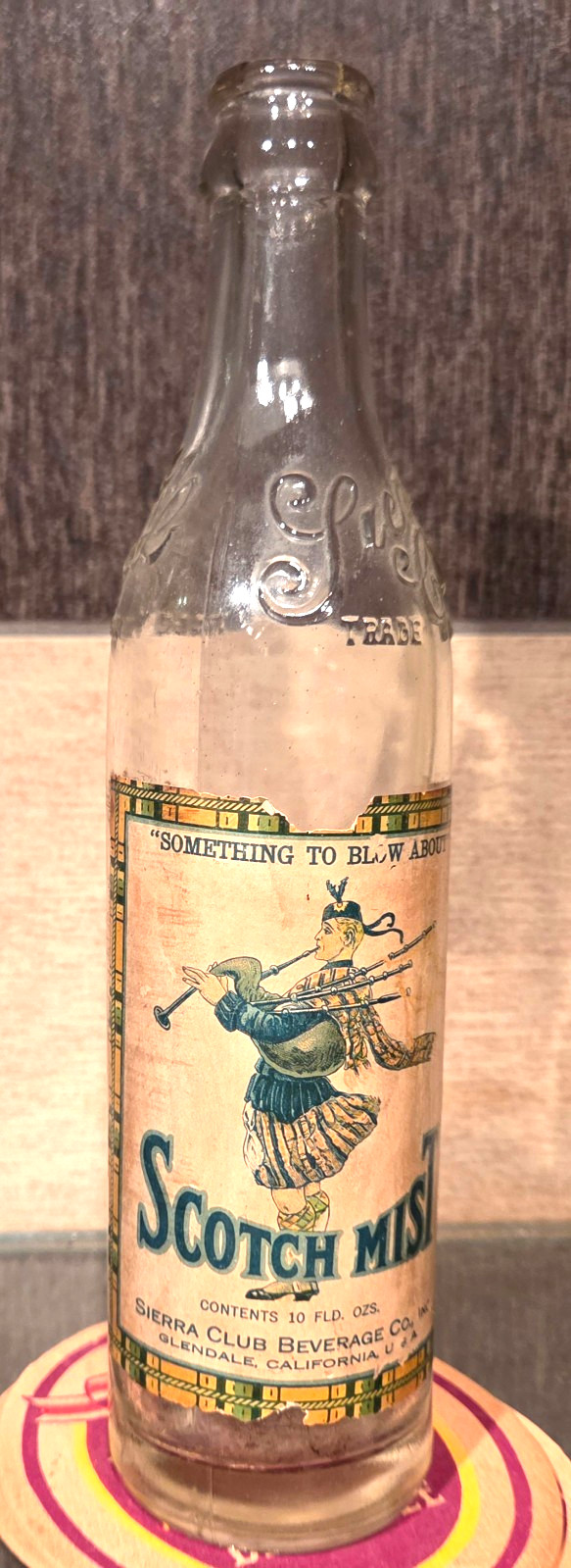 1930'S SIERRA CLUB SCOTCH MIST PAPER LABEL EMBOSSED BOTTLE GLENDALE CA 10 OUNCE