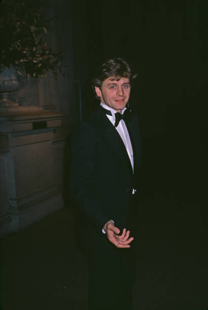 Mikhail Baryshnikov wearing a tuxedo bow tie attends the Valentino- Old Photo