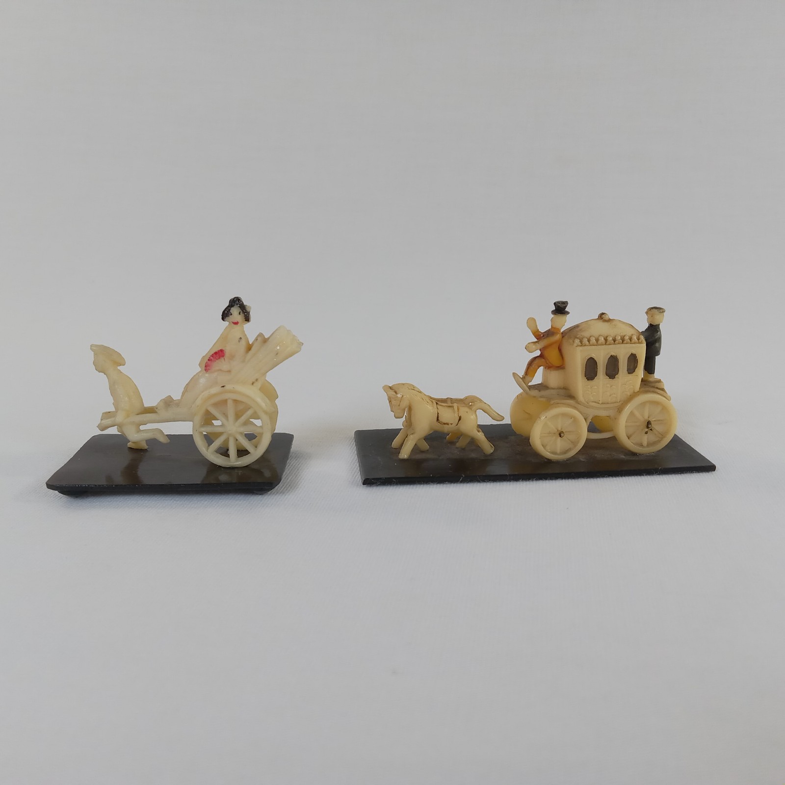 Vintage Celluloid ? Miniature Figurines Japan Lady on Cannon & Horse Carriage