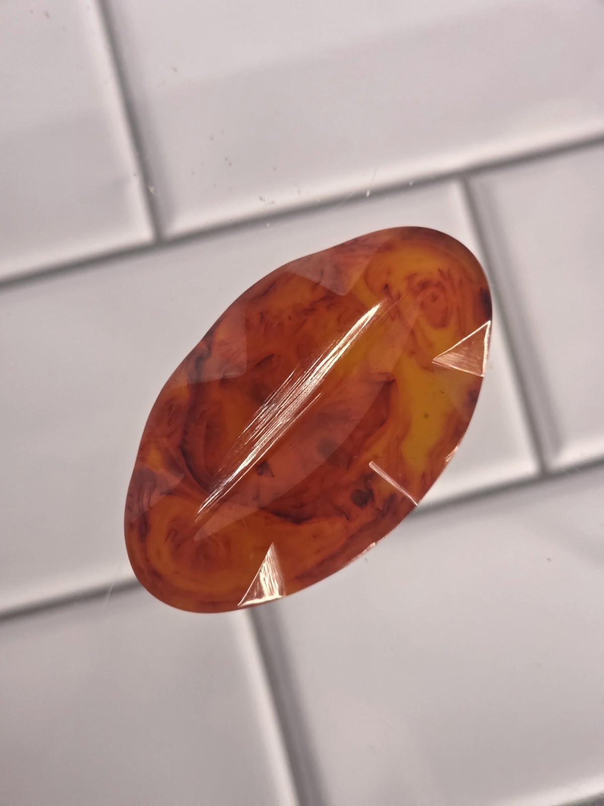 Vintage Orange Marbled Bakelite Carved Oval Jewelry Piece