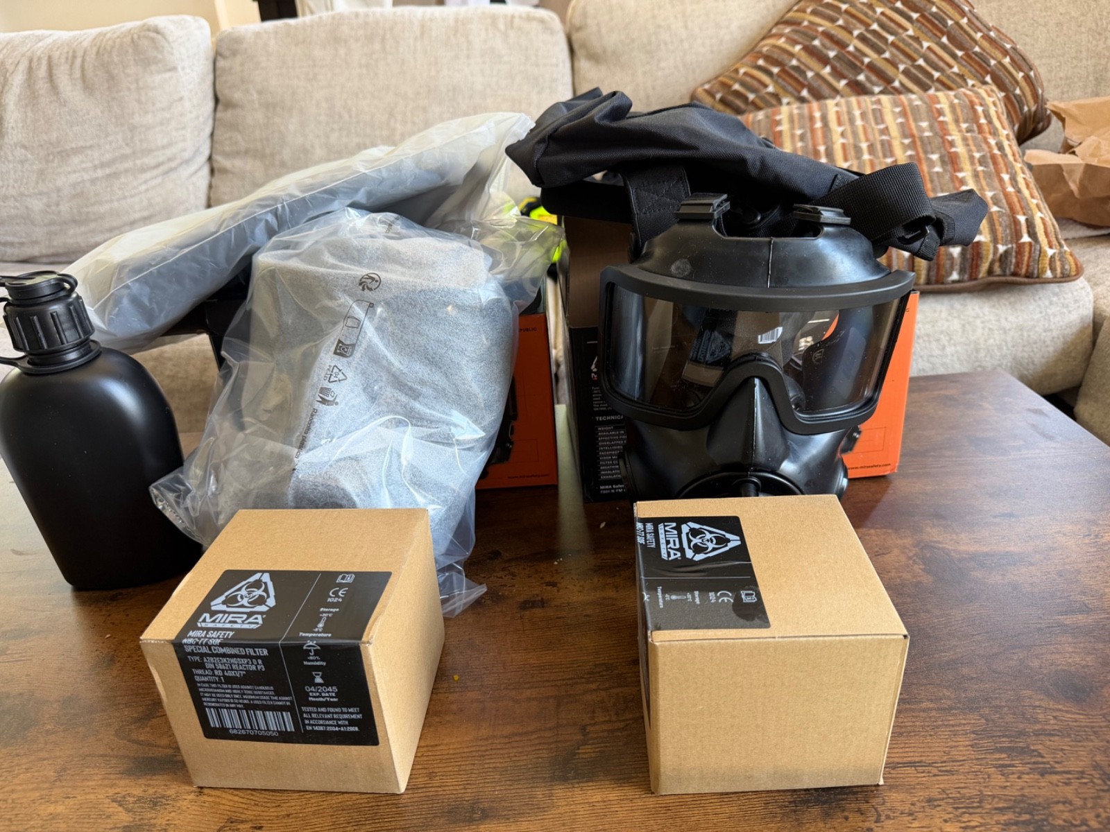 Brand new MIRA gas masks NEVER USED Canteen, new filter, and carry bag.