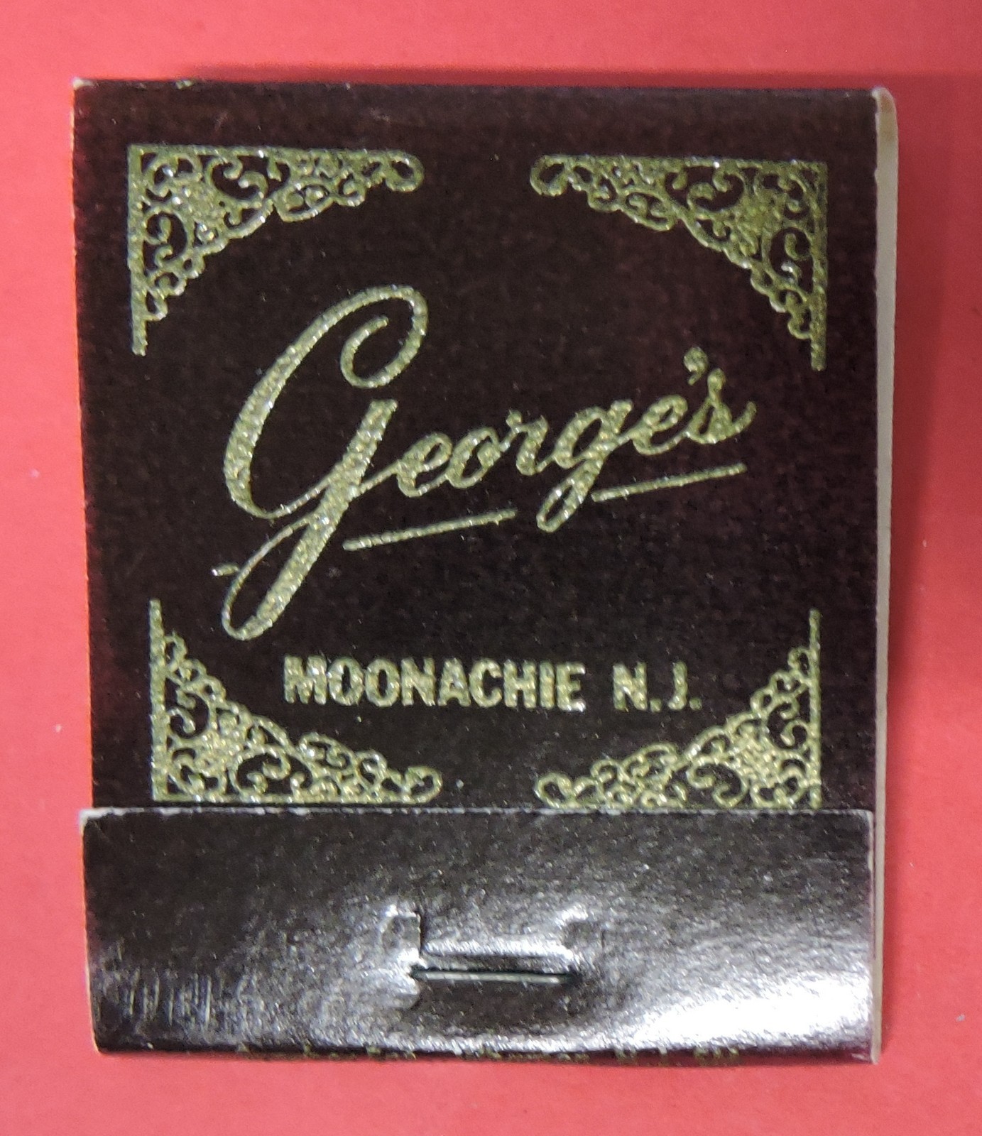 GEORGE\'S UNSTRUCK ADVERTISING MATCHBOOK-MOONACHIE NEW JERSEY-NJ