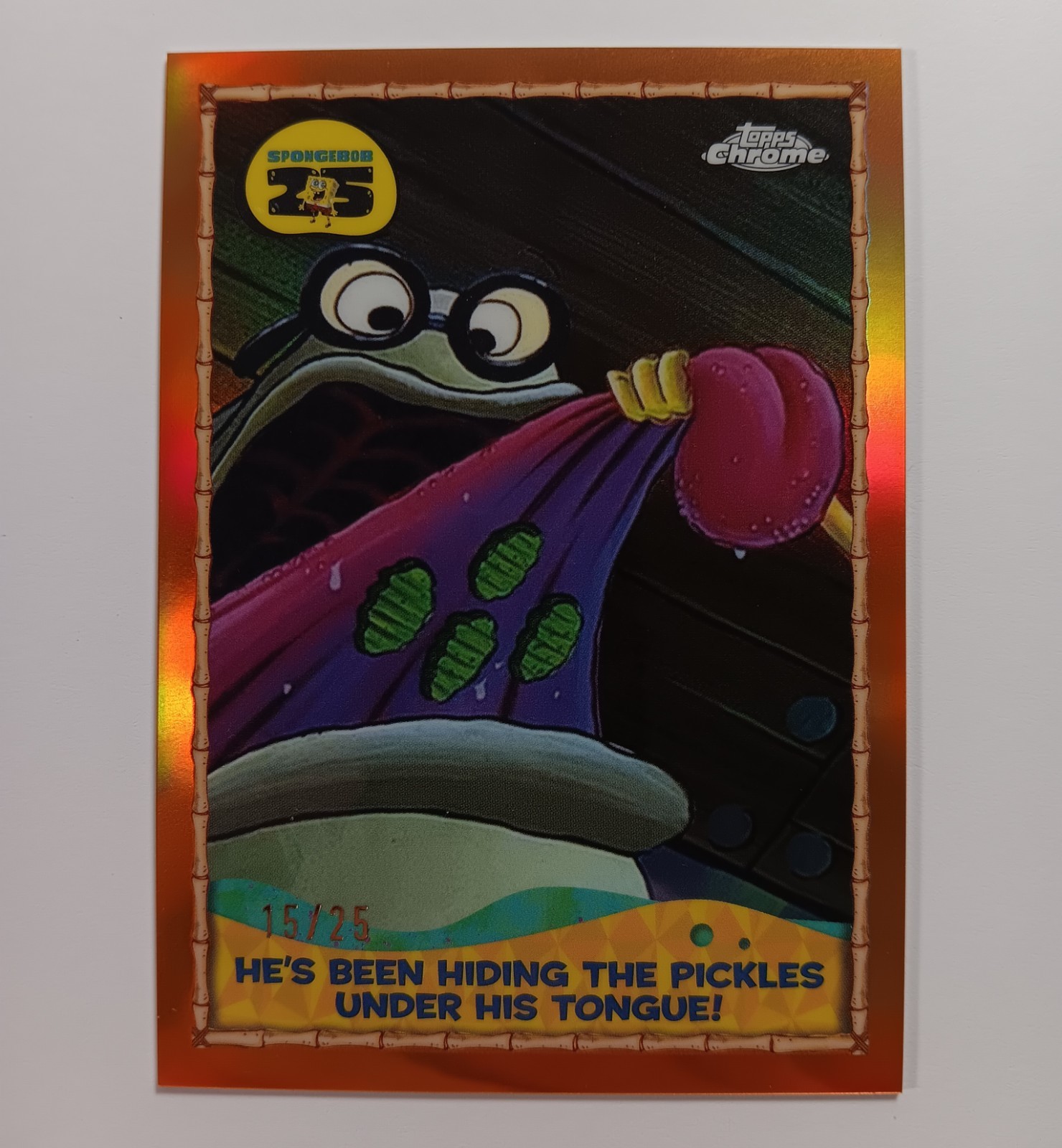 2025 Topps Chrome SpongeBob Hiding Pickles Under His Tongue 25-10 Orange /25