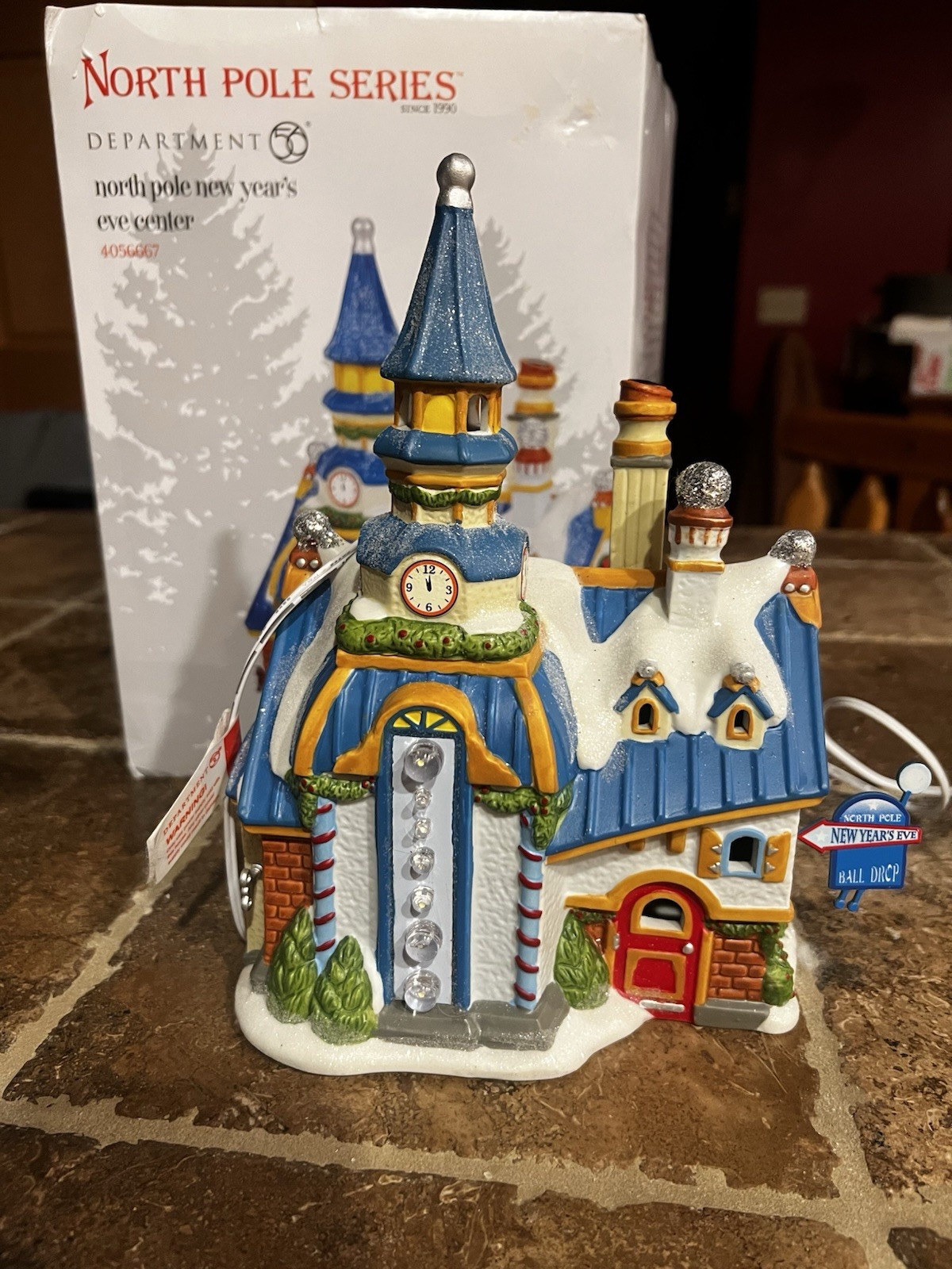 Dept 56 North Pole “New Year’s Eve Center”SKU: 4056667 Intro 2017 – Retired 2017