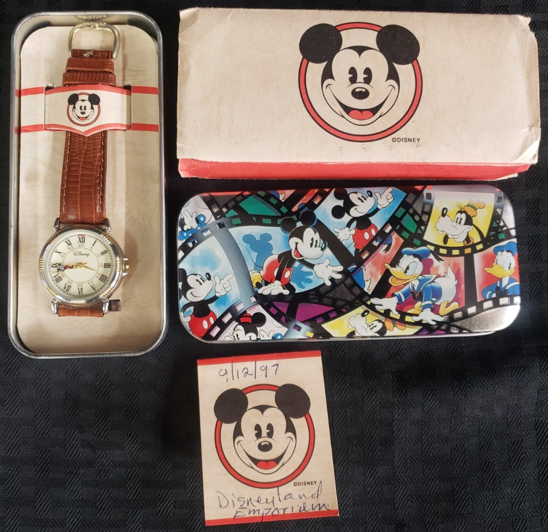 478716 - Disney Time Works Mickey Mouse Holding Second Hand Watch with Case