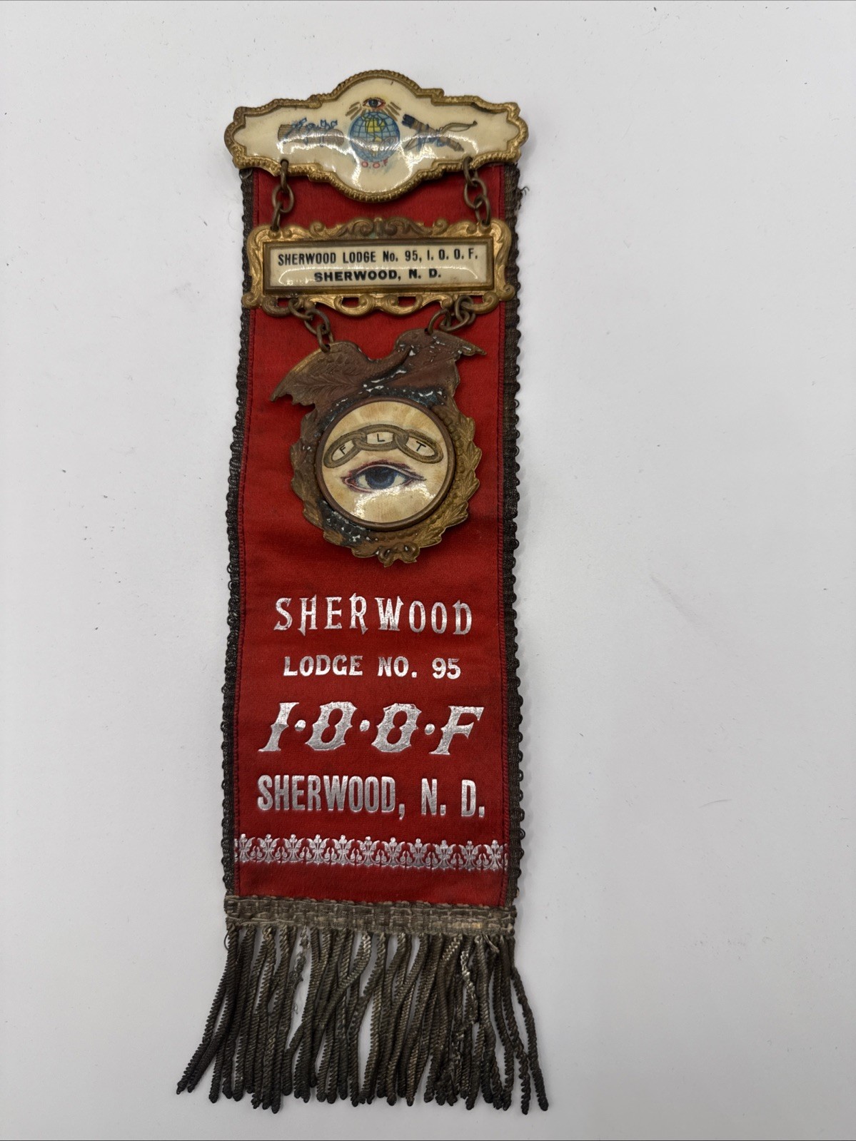 Antique IOOF Odd Fellows Badge Celluloid Ribbon Seeing Eye Shereood, ND Lodge 95