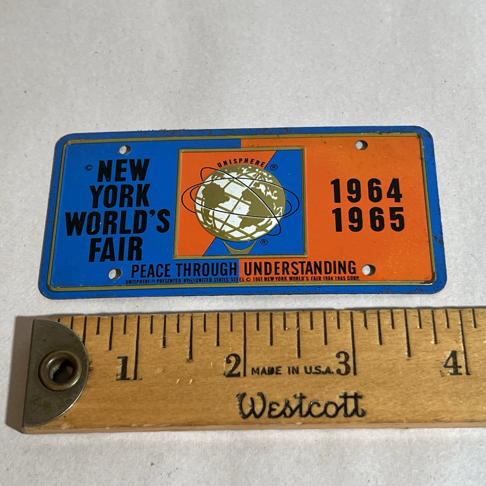 ORIGINAL VINTAGE NEW YORK WORLDS FAIR UNISPHERE BICYCLE LICENSE PLATE 1964-1965