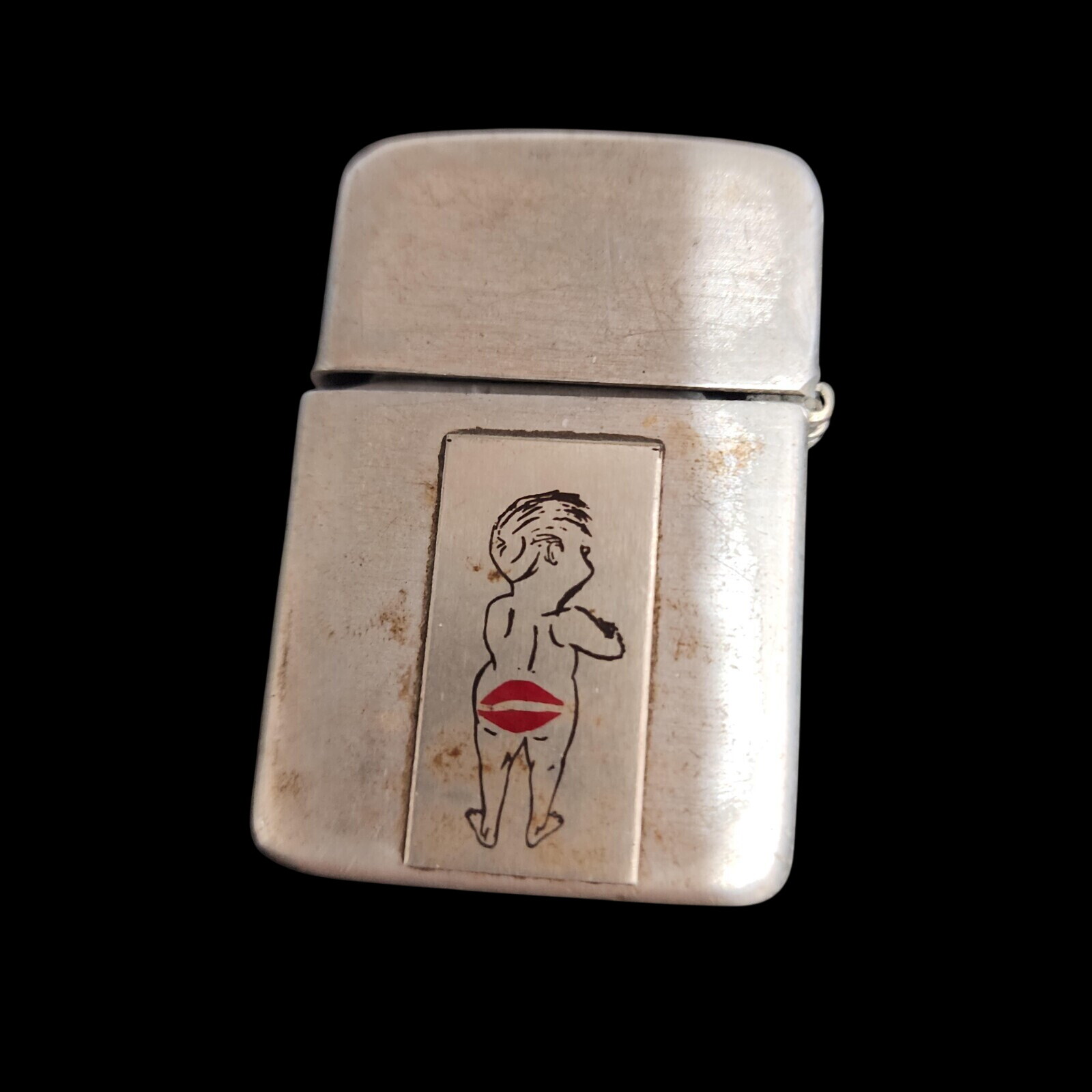 VTG WWII era Storm King Naughty Novelty Lighter With Cheeky Design & Kiss Mark