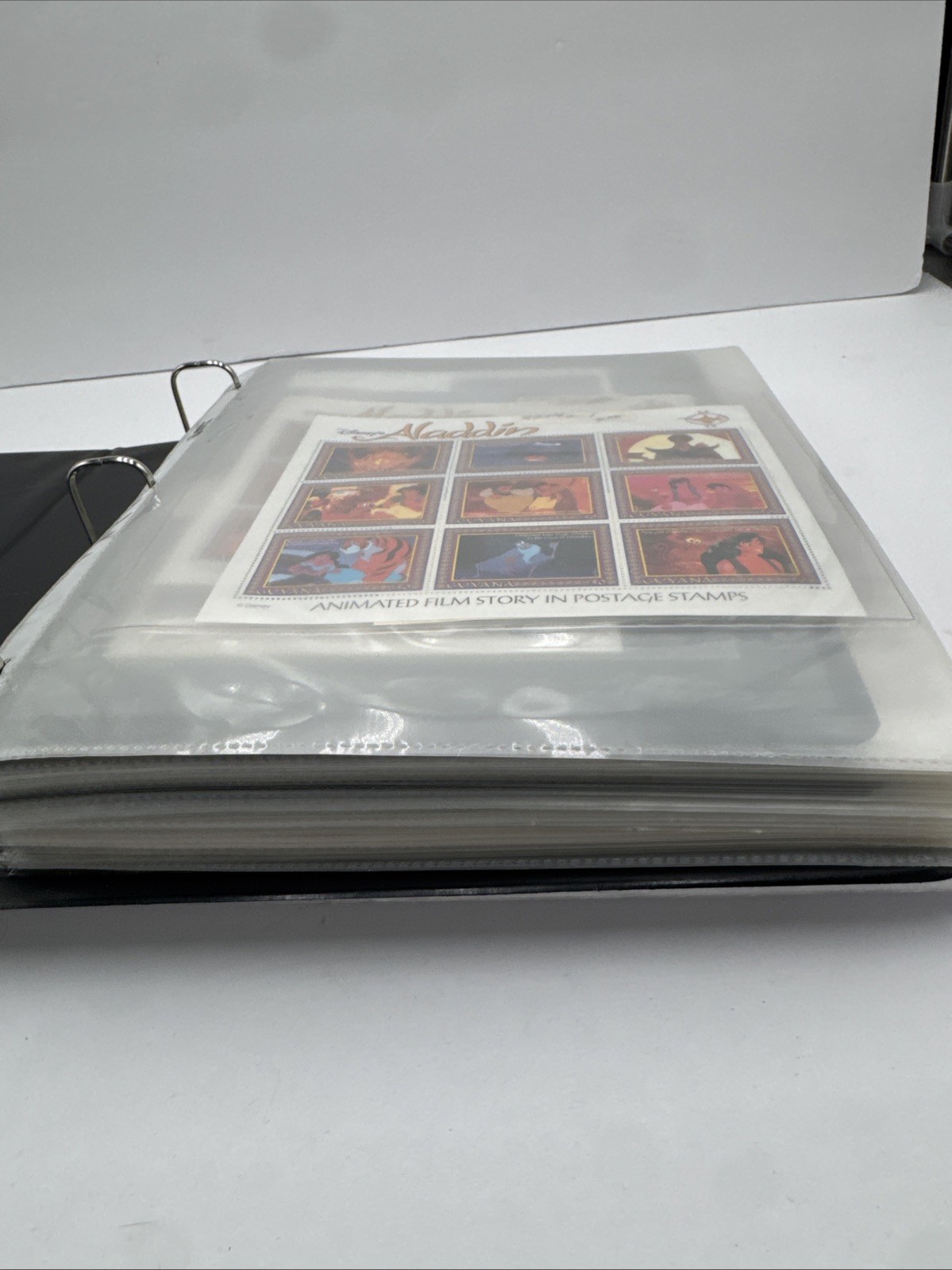 VTG Walt Disney Collector Stamps Over 60 sleeves of stamps 