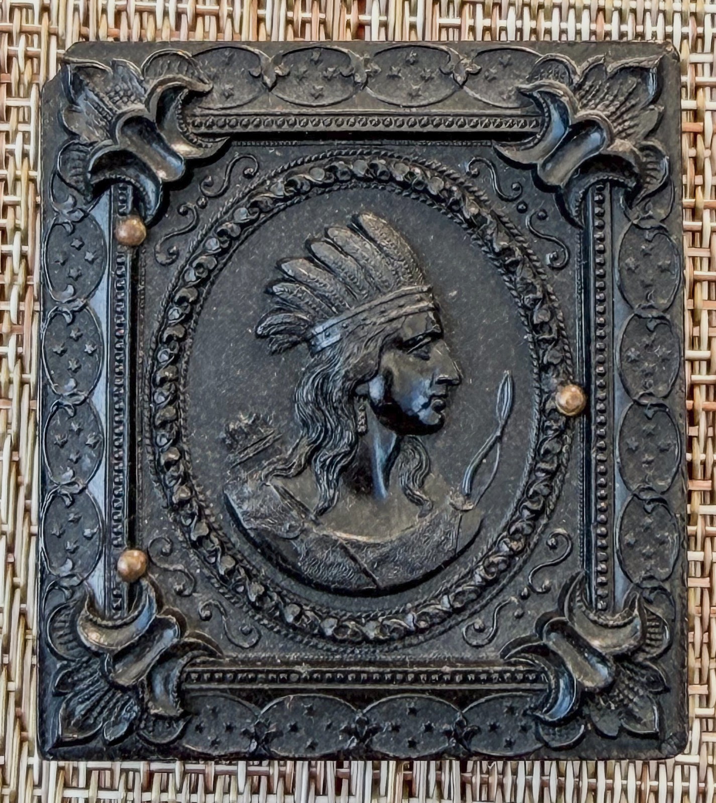 Sixteenth Plate Indian Profile Union Case with Ruby Ambrotype of Woman