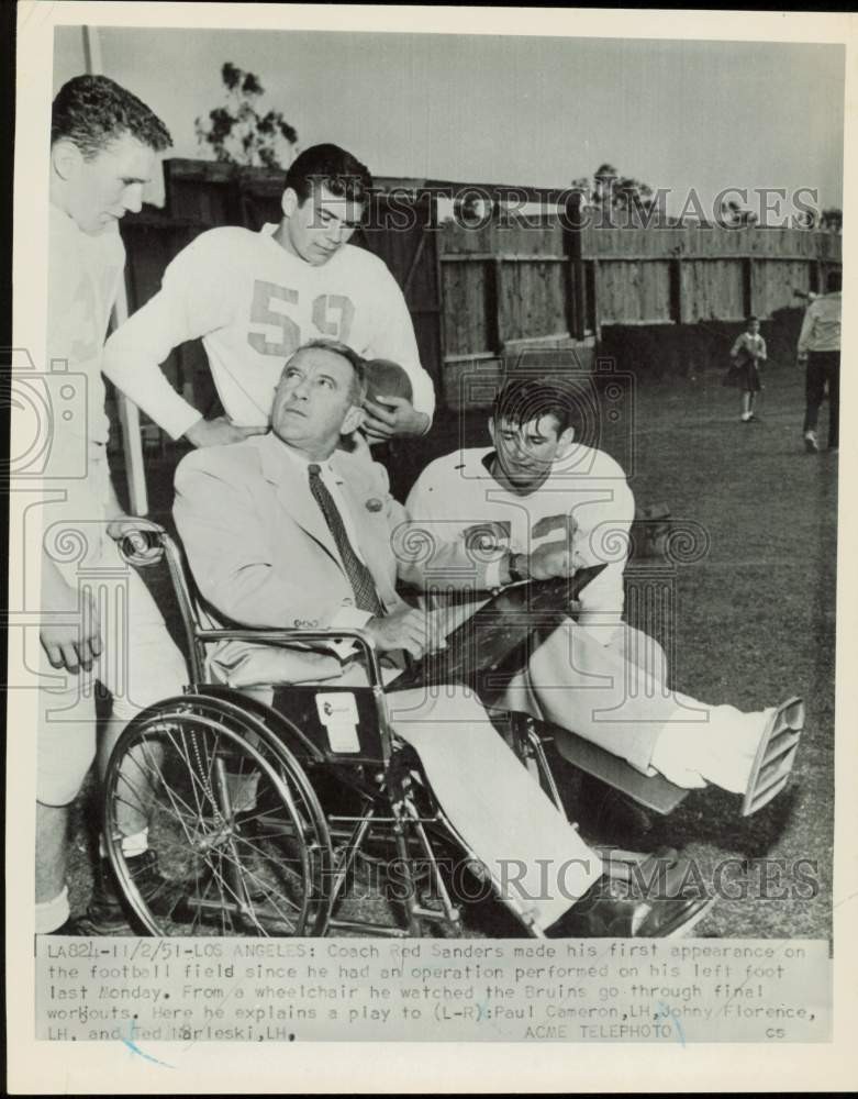 1951 Press Photo Red Sanders explains a play to his players in Los Angeles