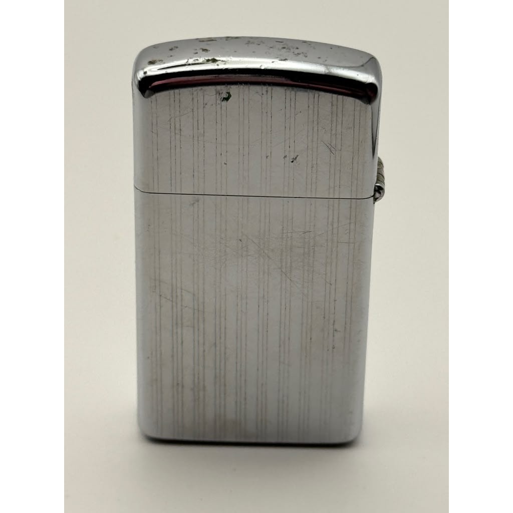 1975 Zippo Slim Vertical Lines Chrome Windproof Lighter Vintage USA Untested