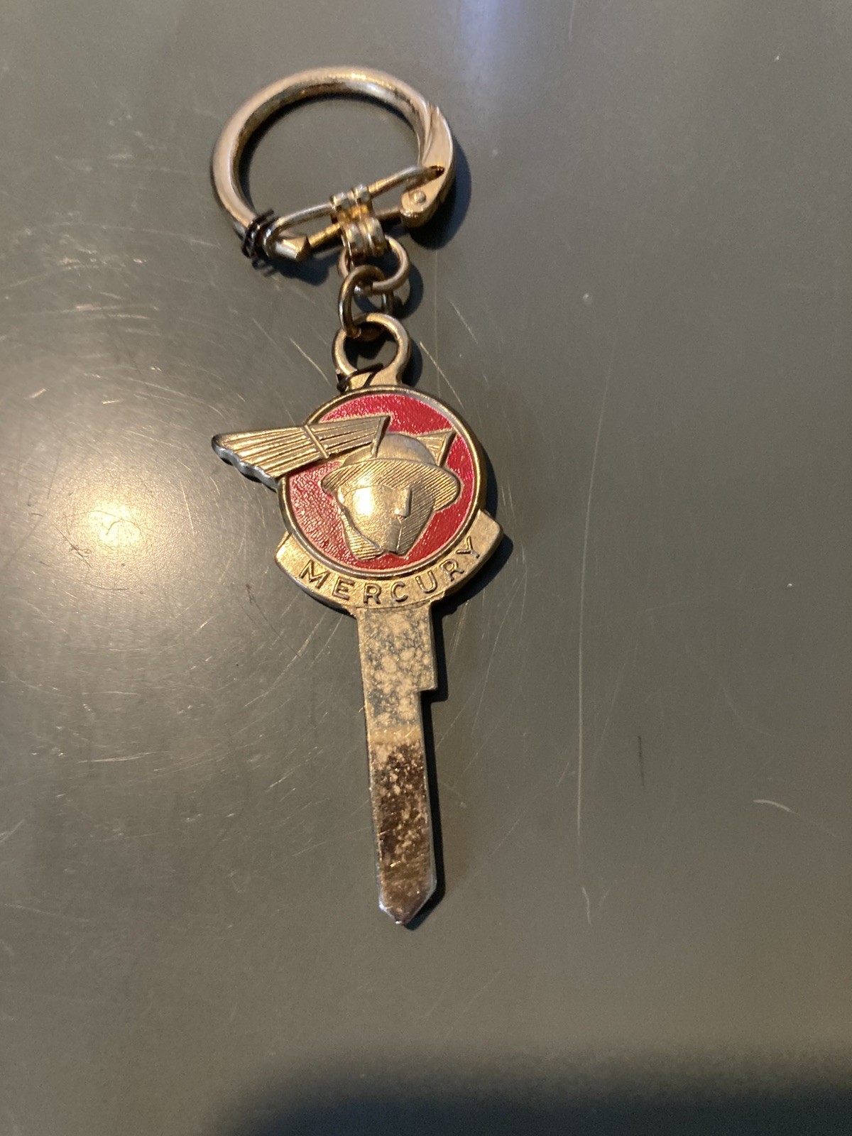 Vintage '50s Mercury Messenger Winged Man Logo - Uncut Key Blank